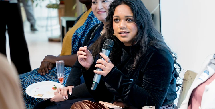 Women of colour in conversation at an Empower'em event