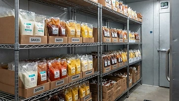 Foodservice sauce bags stored in a walk-in cooler
