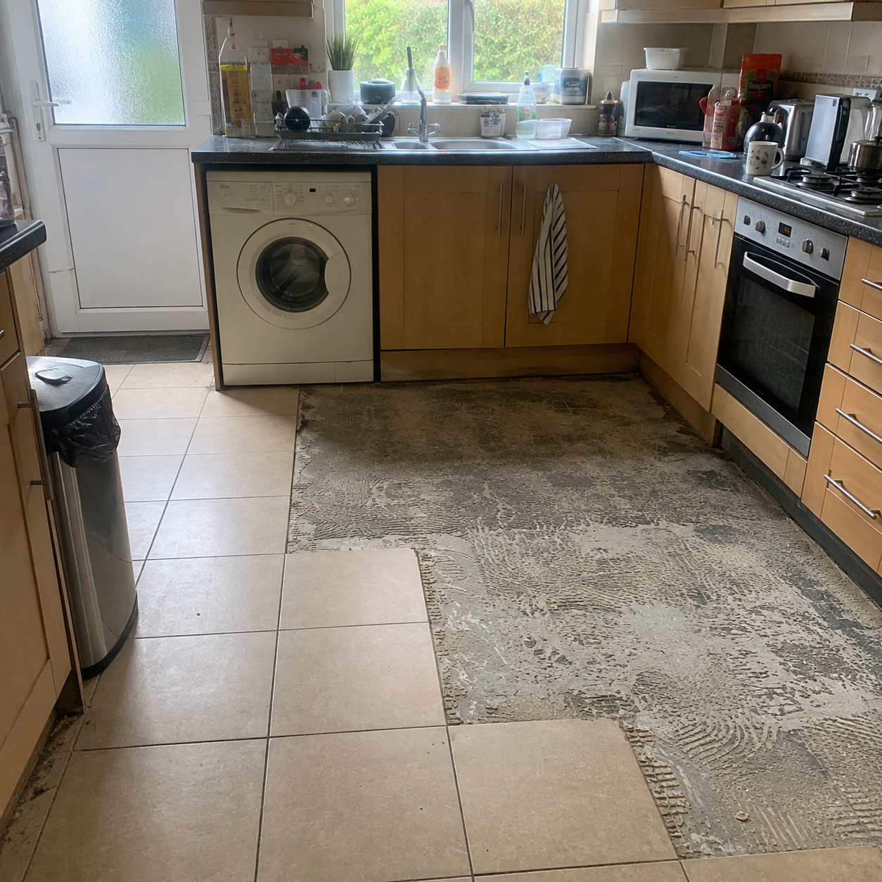 Remove the remaining tiles and refit all new tiles