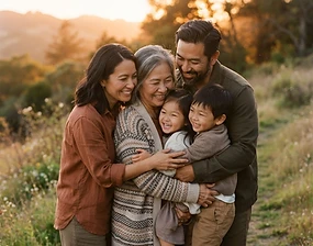 A family embracing outdoors