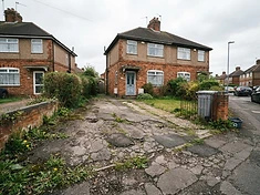 An ageing tarmac drive