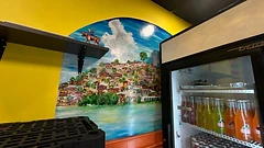 Wall mural of a Michoacán hillside town