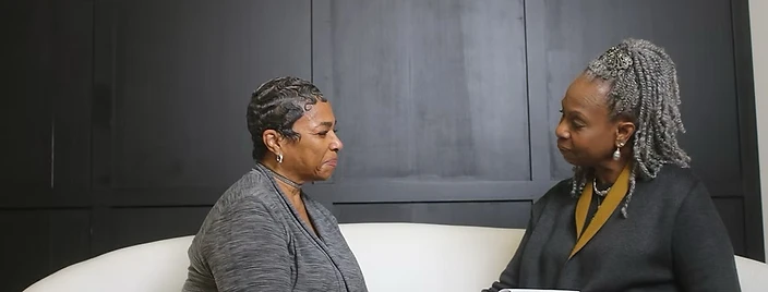 Grace Carleton in a confidential coaching session with a client