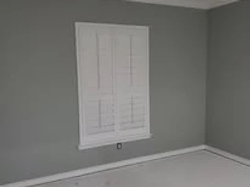 Living room with freshly painted gray walls, residential interior painting in Midland, TX