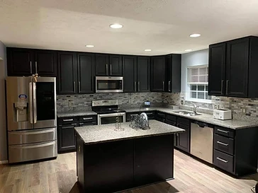 Kitchen with black refinished cabinets, cabinet painting and refinishing in Midland, TX