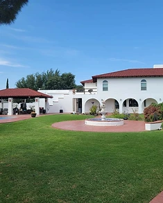 Spanish-style stucco home with freshly painted exterior, residential exterior painting