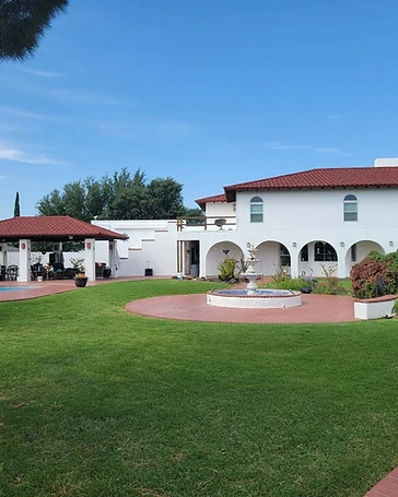 Spanish-style stucco home with freshly painted exterior, residential exterior painting