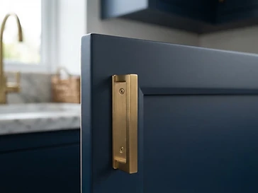 Close-up of a cabinet door with a smooth painted finish