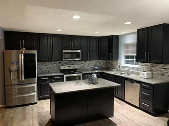 Dark espresso kitchen cabinets with shaker doors and new hardware, cabinet painting and refinishing in Midland, TX