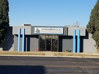 Commercial facility with painted exterior and blue accent pillars, commercial facility painting in Odessa, TX