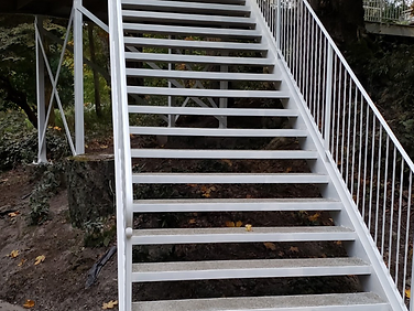After — staircase blasted clean and primed