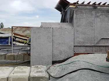 After — industrial hopper being blasted clean