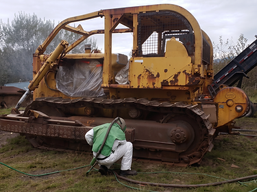 Before — weathered bulldozer tracks