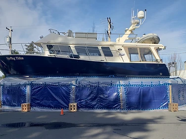 Before — boat hull prior to blasting