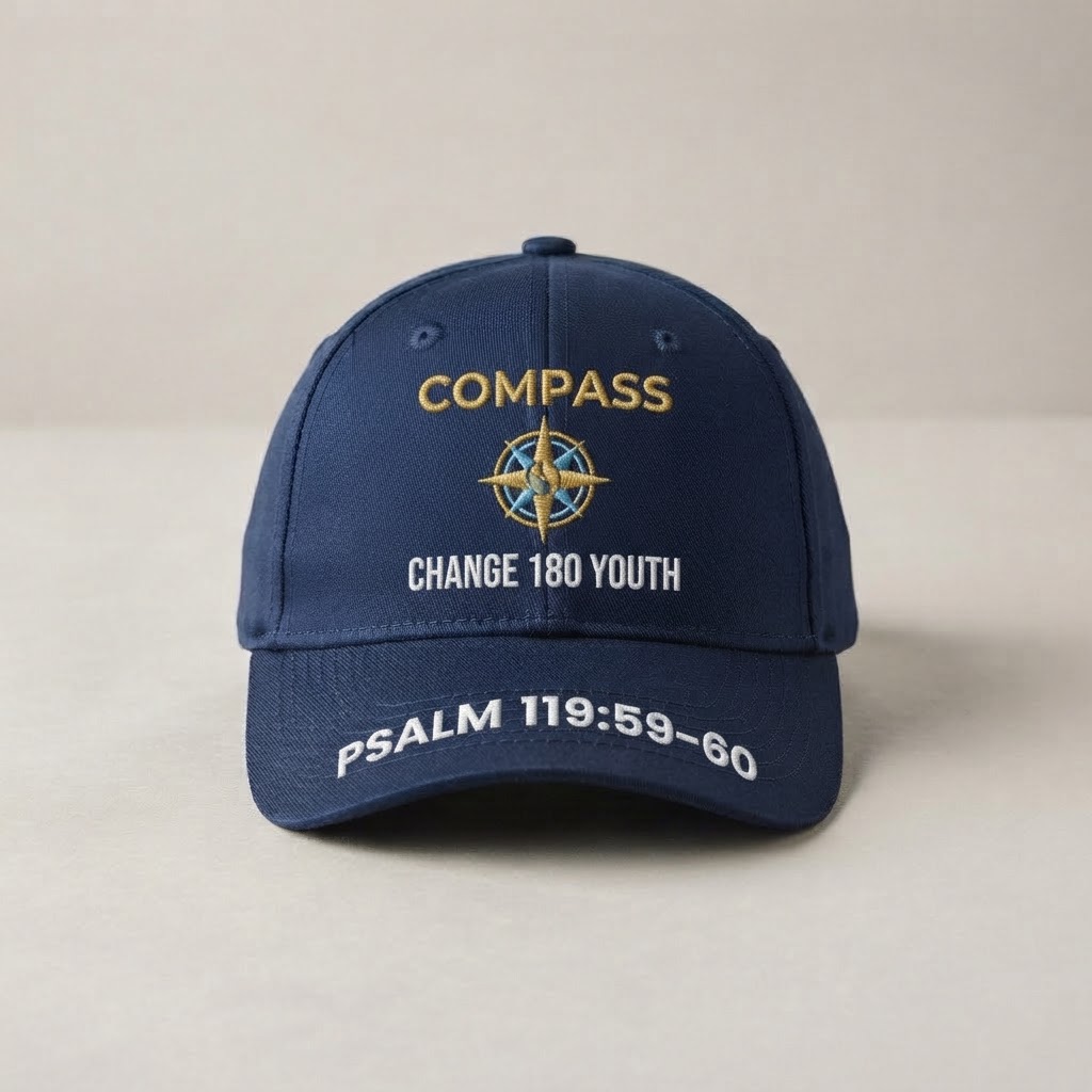 The 180 YOUth Cap - navy cap with the COMPASS lockup