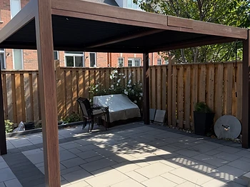 Gazebo Penguin 10×13 pergola installed on pavers / interlock in Mississauga, Ontario — photo 1