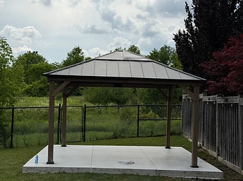 Sunjoy 13×15 gazebo installed on concrete in Brampton, Ontario