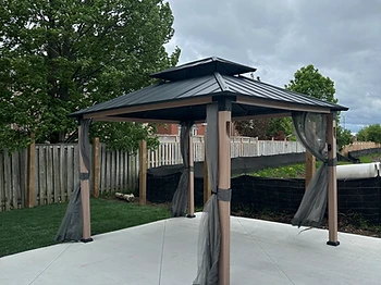 Hampton Bay 10×12 gazebo installed on concrete in Hamilton, Ontario — photo 2