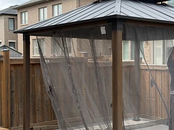 Hampton Bay 10×12 gazebo installed on concrete in Brampton, Ontario — photo 1