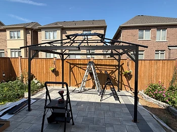 Domi 10×12 gazebo installed on pavers / interlock in Etobicoke, Ontario — photo 2