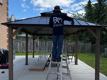 Sunjoy 12×20 gazebo installed on concrete in Scarborough, Ontario — photo 1