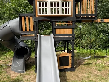 Backyard Discovery swing set installed on grass / ground in Bolton, Ontario — photo 1