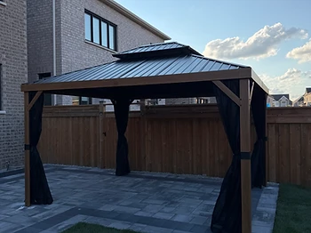 Gazebo Penguin 10×12 gazebo installed on pavers / interlock in Brampton, Ontario — photo 2