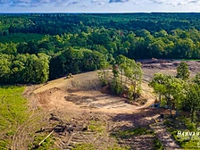 Aerial view of a new pond excavation and grading project completed by Hannah Montana CDR in Livingston, Texas