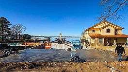 Fresh residential concrete garage pad installed by Hannah Montana CDR in Livingston, Texas