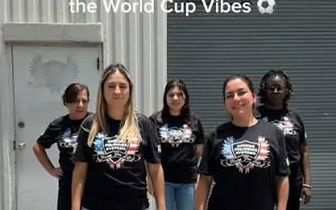 Xtreme Polishing Systems office team women in XPS logo shirts