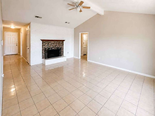Tiled living room with fireplace