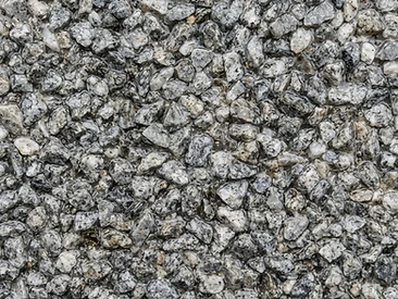 Derby Grey resin-bound aggregate close-up showing natural washed stone in clear resin