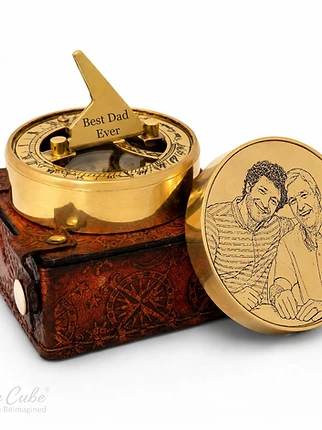 Personalized brass sundial compass engraved with a father and son portrait