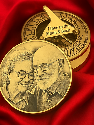 Engraved brass compass with a couple portrait on red silk