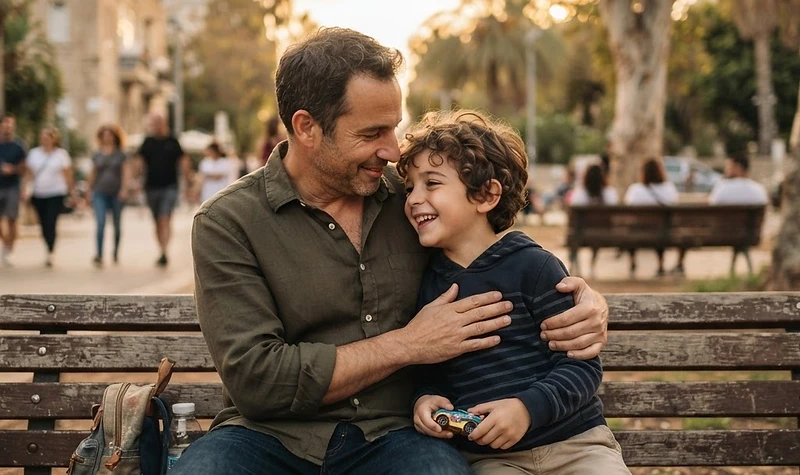 אב וילד מבלים זמן איכות משותף באווירה רגועה במסגרת הסדרי שהות לאחר גירושין
