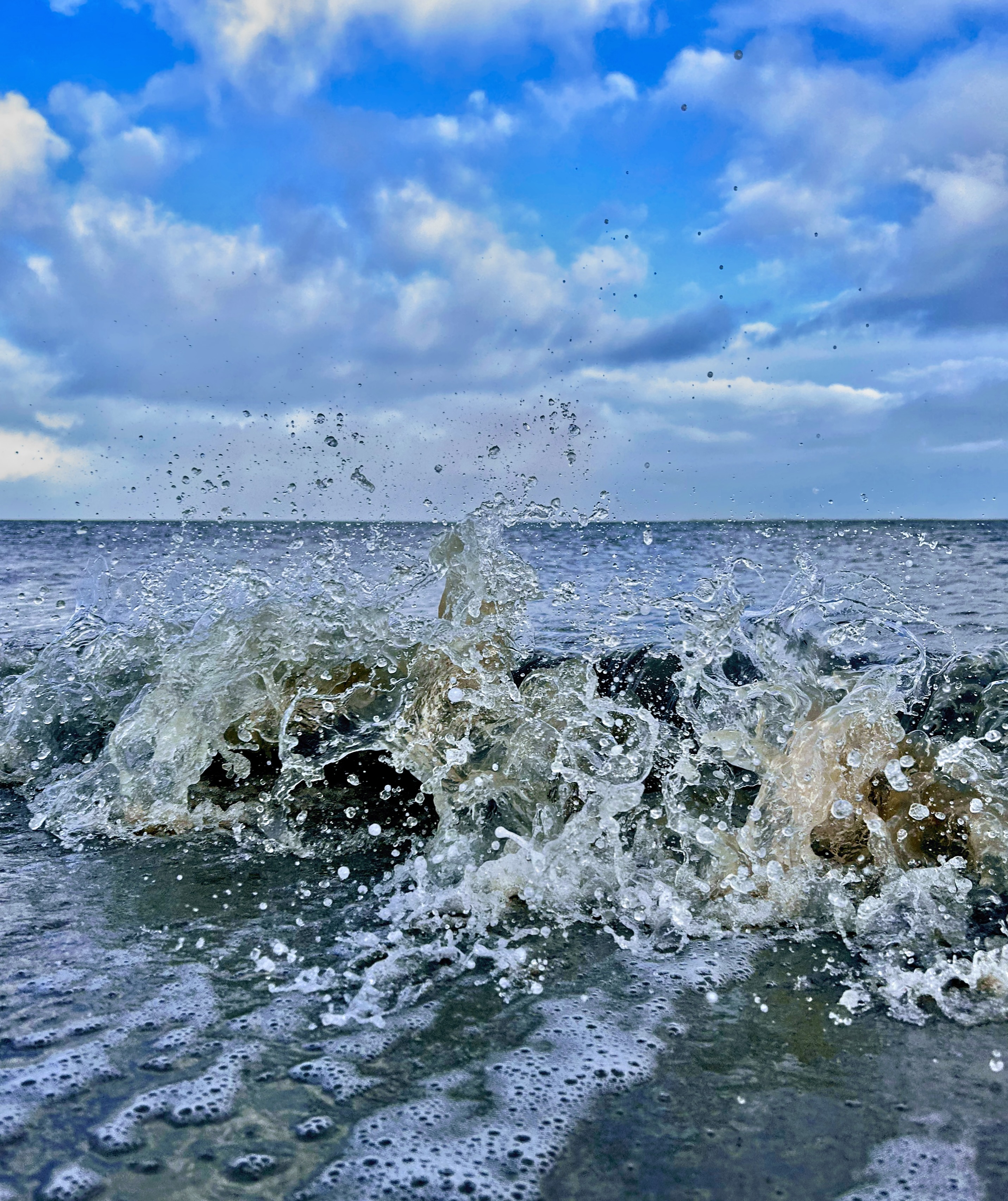 Wave on the coast of a beach in Texel, Netherlands