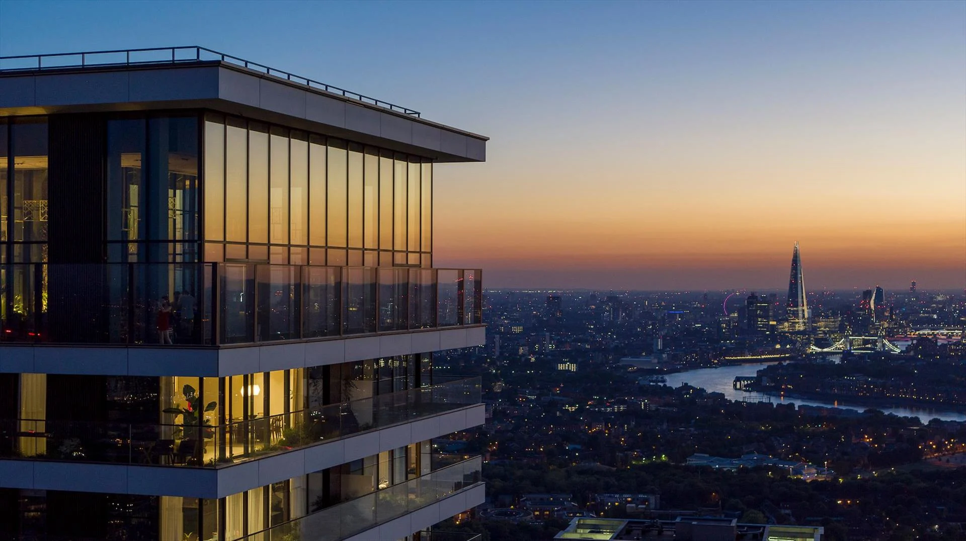 The Observatory sky-bar at dusk, Canary Wharf skyline behind