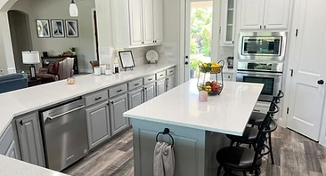 kitchen cabinets freshly painted with a grey finish