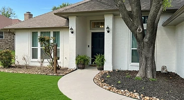 white brick exterior home freshly painted