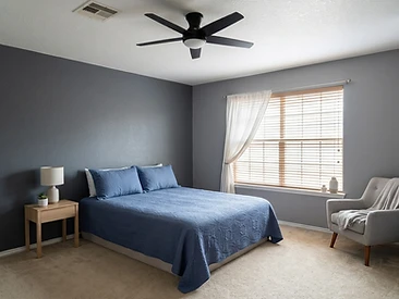 primary bedroom interior walls freshly painted white and grey with ceiling repaint