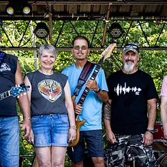 Over and Out performing on an outdoor stage