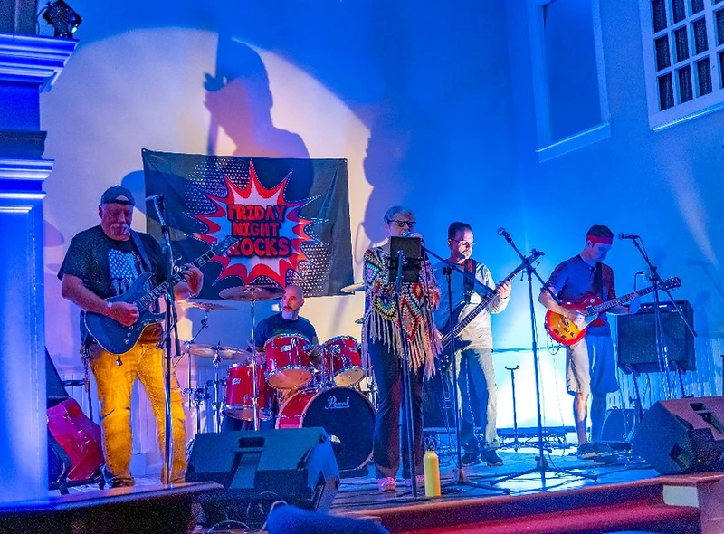 Over and Out performing at a community fundraiser