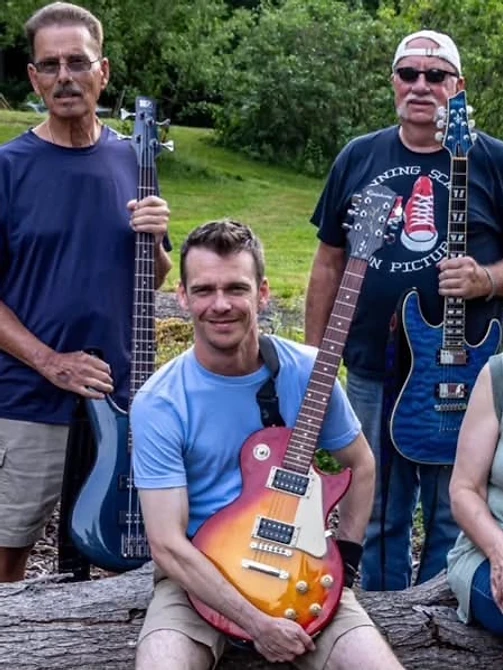 Over and Out band portrait outdoors in the woods