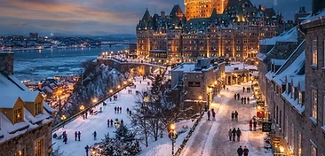 Romantic view of the Château Frontenac and Dufferin Boardwalk in Old Quebec City at dusk