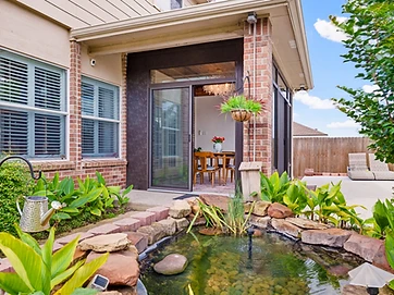 Custom sunroom enclosure designed to match home style