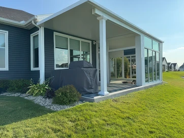 Sunroom addition with elevated deck access