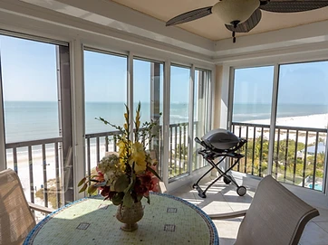 Sunroom interior with ocean view from high-rise condo