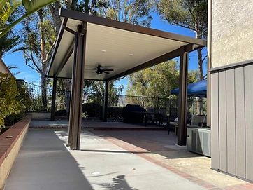 Solid aluminum attached patio cover with ceiling fan