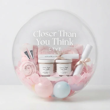 Give the gift of pure connection and beautiful moments with the Closer Than You Think™ Mommy & Me Stuffed Balloon Bundle! Perfectly packaged inside a breathtaking, crystal-clear custom gift balloon, this all-in-one set is intentionally designed to create an enriching, stress-free spa experience for parents and children to share.

At the heart of this bundle are our signature Waterless Botanical Masques. Because we skip the water and liquid fillers, our rich powder blends remain incredibly lightweight, highly concentrated, and perfectly safe to ship sealed inside a balloon. Activated directly by you at home, this gentle formula combines premium white Kaolin clay with nourishing hibiscus flower, moringa, and rosemary to cleanse and soothe sensitive skin.

Inside, you will find everything needed for an instantaneous luxury spa afternoon: two nested mixing bowls, two flexible silicone applicators, a precise measuring scoop, matching plush ear headbands, and premium satin scrunchies. Pop open your beautifully curated custom balloon, unravel the included instruction scroll, and step into a cozy wellness experience built on the truth that love is always closer than you think. Created with devotion by HERSTORY0306 Production & Publishing.