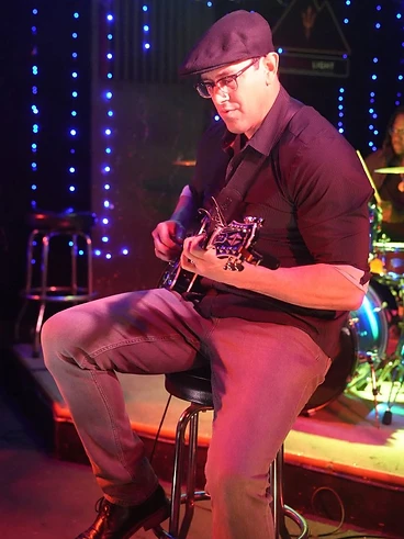 James on guitar